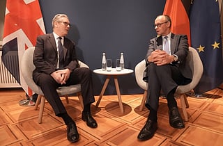 Britain's Prime Minister Keir Starmer (L) attends a bilateral meeting with Germany's Chancellor Friedrich Merz (R) during the Munich Security Conference in Germany on February 13, 2026.