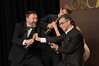 Jack Piatt, Sam A. Davis, Natalie Musteata, and Alexandre Singh, winners of the Best Live Action Short Film Award for “The Singers” and “Two People Exchanging Saliva”, pose in the press room during the 98th Oscars at Dolby Theatre on March 15, 2026 in Hollywood, California.