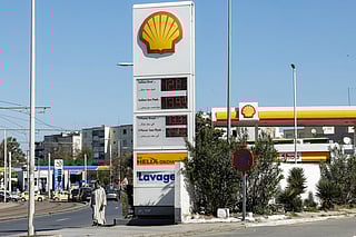 Fuel prices are displayed at a petrol station in Rabat on March 16, 2026, as prices hiked up in Morocco amid geopolitical tensions in the Middle East disrupting the global oil market.
