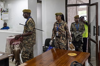 Kenya Wildlife Services wardens deliver exhibits of live ants confiscated from Chinese national, Zhan Kequn and his co-accused Kenyan, Charles Mwangi (both not in picture) to the Jomo Kenyatta International Airport (JKIA) law courts, before the accused arraignment to take a plea against charges of dealing in wildlife species contrary to laws regulating wildlife conservation after they we're found in possession of more than two thousand live ants intended to be trafficked internationally in Nairobi on March 17, 2026.
