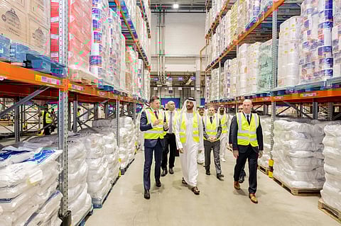 Abdulla bin Touq Al Marri, UAE Minister of Economy and Tourism, visits a Carrefour distribution centre operated by Majid Al Futtaim to review supply operations, alongside CEO Ahmed Galal Ismail and senior executives.