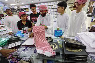 People shop for Eid Al Fitr in Sharjah as joy and gratitude fill the air across the UAE and beyond. As Ramadan draws to a close, mosques are prepared for special prayers while homes and public spaces glow with festive lights. Families gather to buy new clothes, sweets and gifts, embracing the traditions of sharing, charity and togetherness that define the spirit of Eid.