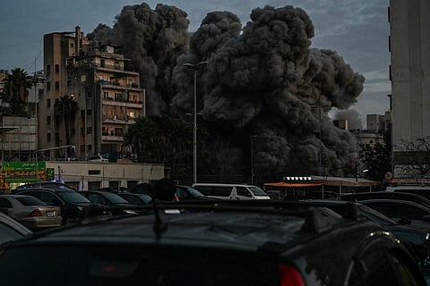 Building collapses in central Beirut after Israeli strike