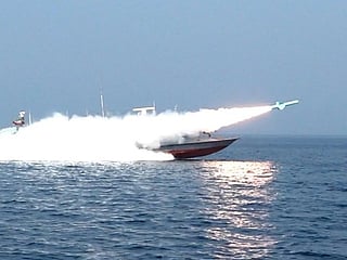 This handout photo released by Iran's Revolutionary Guards Corps (IRGC)'s official website Sepanews on February 17, 2026, shows a rocket being fired from a boat during a military exercise by members of the IRGC and navy in the Strait of Hormuz.