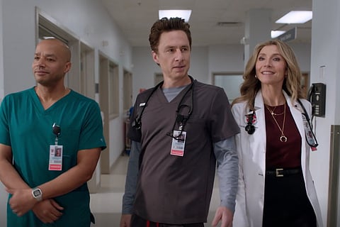 Zach Braff (J.D.), Donald Faison (Turk), and Sarah Chalke (Elliot) in the show. 