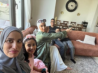 Inas Ali Zaidan with her family. 