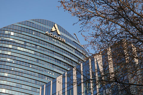 Logo of French multinational hospitality company Accor displayed on the facade of its headquarters in Issy-les-Moulineaux, outside Paris on March 19, 2026.