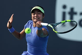 Alexandra Eala of the Philippines returns a shot against Magda Linette of Poland during Day 5 of the Miami Open at Hard Rock Stadium on March 21, 2026 in Miami Gardens, Florida.