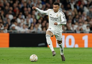 Real Madrid's French forward #10 Kylian Mbappe controls the ball during the Spanish league football match between Real Madrid CF and Club Atletico de Madrid at Santiago Bernabeu Stadium in Madrid on March 22, 2026.
