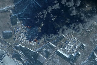 This handout satellite image taken on March 23, 2026 by Planet Labs PBC shows smoke rising from the Russian oil terminal at Primorsk, the most important Russian loading port in the Baltic Sea, following a drone attack claimed by Ukraine