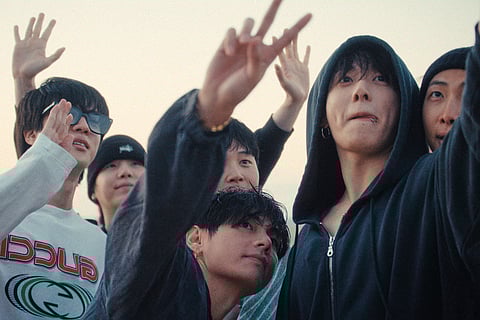 This image released by Netflix shows BTS members, from left, Jin, Suga, Jimin, V, Jung Kook, and RM in a scene from the documentary "BTS: The Return." (Netflix via AP)