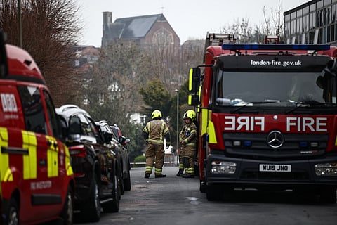 Firefighters are pictured in the Golders Green neighbourhood of north London on March 23, 2026, after volunteer ambulances run by a Jewish organisation were set on fire overnight.
