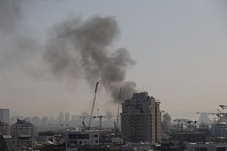 Smoke rises from an Iranian missile strike in Tel Aviv. File photo taken on March 23, 2026. For illustrative purposes only.