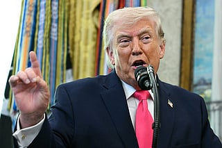 US President Donald Trump speaks during a swearing in ceremony for new Homeland Security Secretary Markwayne Mullin in the Oval Office of the White House in Washington, DC, on March 24, 2026.