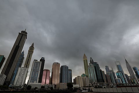 Dubai’s towering skyline meets the clouds today.