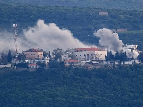 Smoke rises from Israeli artillery shelling on the village of Bayada as it is seen from Tyre city, south Lebanon. File photo taken on Thursday, March 26, 2026. 