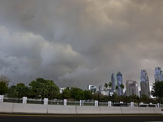 Dark clouds loom over Dubai skyline on Thursday. 