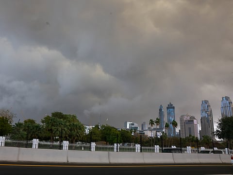 Dark clouds loom over Dubai skyline on Thursday. 