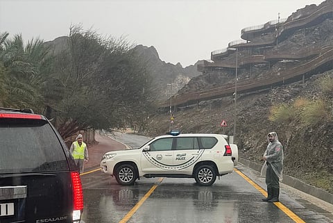 Dubai police during rain