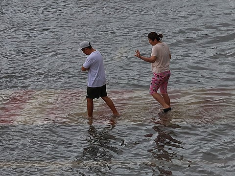 Downpour hits Sharjah, teams move quickly to clear roads