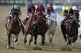 Jockey Jose Ortiz wins Race 9 during the Dubai World Cup horse race in Dubai on March 28, 2026.