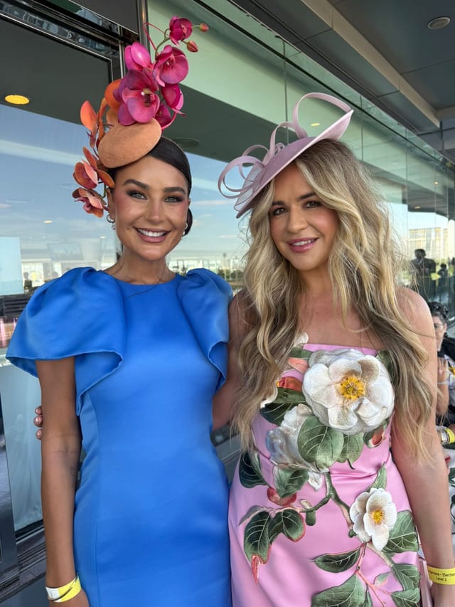 Becky Page and her friend styled to impress embracing the spirit of the day in bold looks