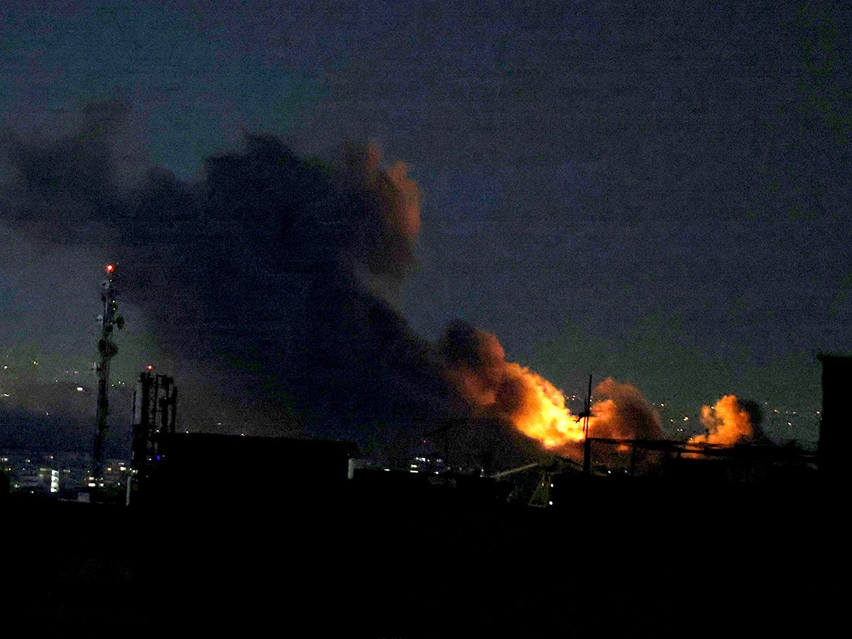 A plume of smoke rises from the site of a strike in Tehran on March 29, 2026.