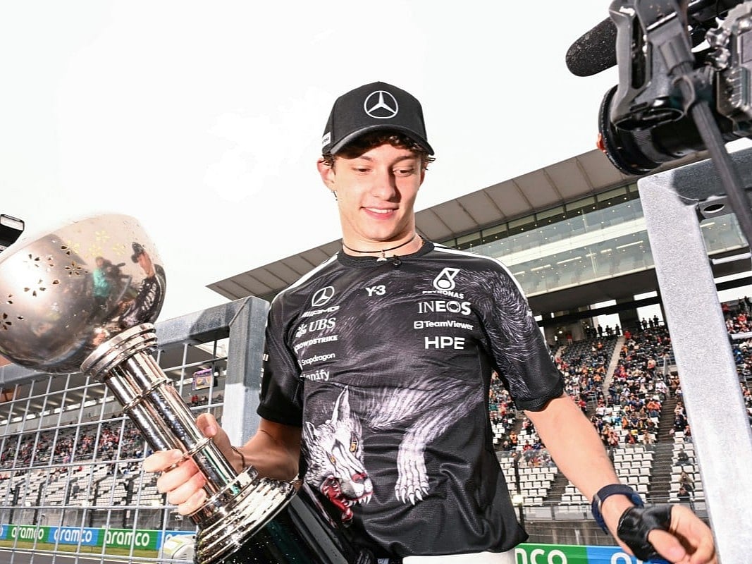 Mercedes' Italian driver Kimi Antonelli celebrates with his team after winning the Formula One Japanese Grand Prix at the Suzuka circuit in Suzuka, Mie prefecture on March 29, 2026.