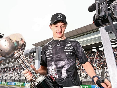 Mercedes' Italian driver Kimi Antonelli celebrates with his team after winning the Formula One Japanese Grand Prix at the Suzuka circuit in Suzuka, Mie prefecture on March 29, 2026.