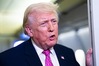 President Donald Trump speaks with members of the media onboard Air Force One on March 29, 2026 while en route to Joint Base Andrews, Maryland from West Palm Beach Florida.