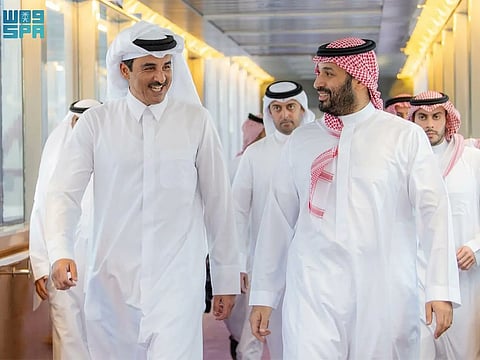 Saudi Arabia’s Crown Prince Mohammed bin Salman with Qatar’s Emir Sheikh Tamim bin Hamad Al Thani (left).