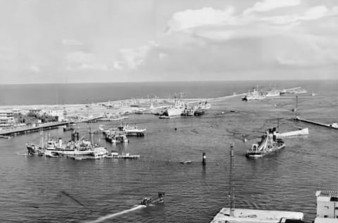 An overview of the Suez Canal at Port Said showing a number of the blocking ships sunk to prevent use of the canal during the Arab-Israeli War. Egypt closed it from June 5, 1967, to June 5, 1975. The 1967 closure lasted eight years, with the canal acting as a frontline between Egypt and Israeli-occupied Sinai. 