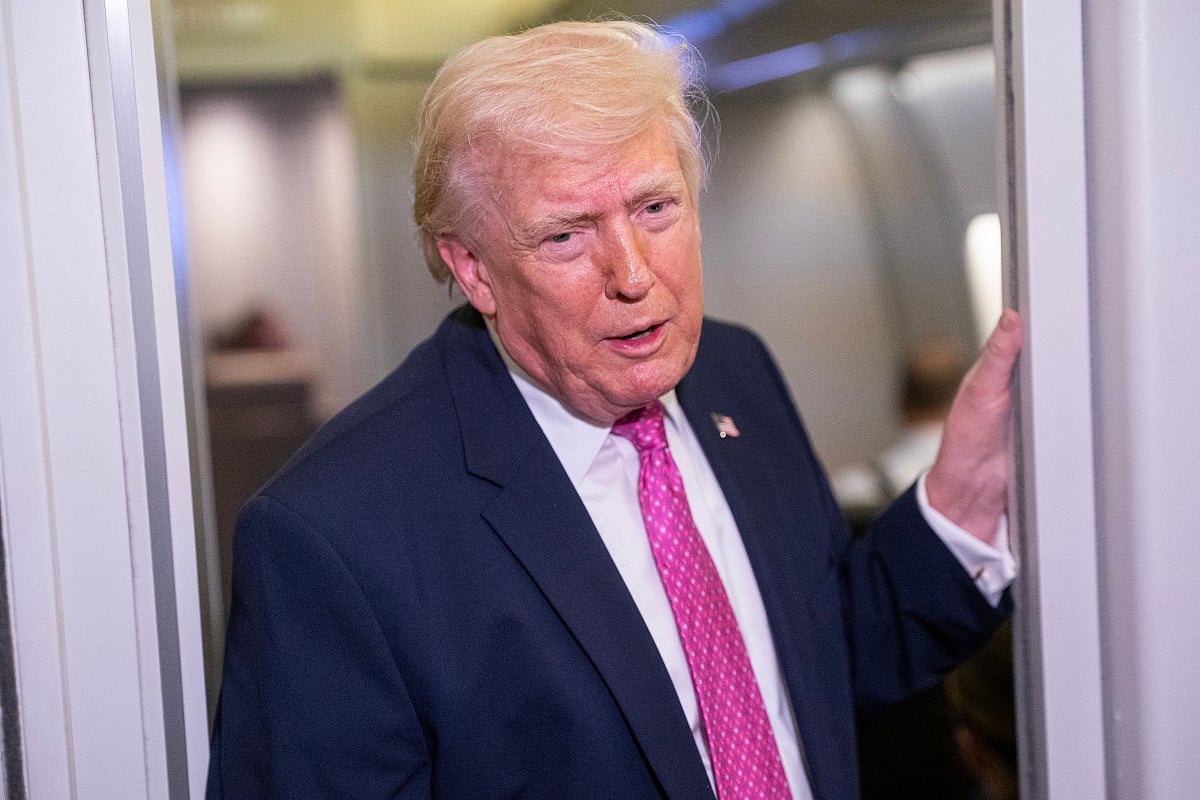 President Donald Trump speaks with members of the media onboard Air Force One on March 29, 2026 while en route to Joint Base Andrews, Maryland from West Palm Beach Florida.