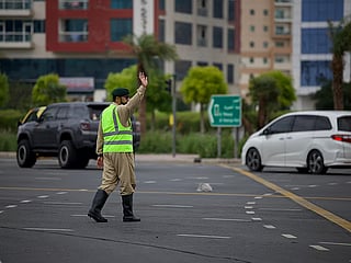 Dubai Police urge caution on rain-soaked roads