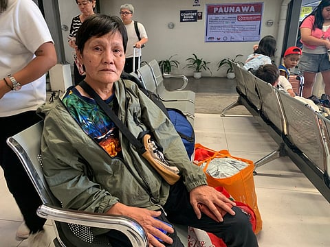 Carmen Pepito dela Cruz, 53, from Iligan City in Mindanao, quietly waits at the Victory Liner Terminal in Quezon City not for a ride home, but for something far more uncertain: a job.