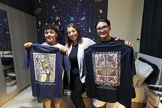 Single mother Randa Alawi with sons Badr mesayri and Bandr Mesayri who are helping her with thier business. 