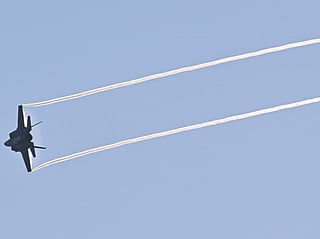 A US military F-35-A fighter jet flies over at José Aponte de la Torre Airport, formerly Roosevelt Roads Naval Station, in Ceiba, Puerto Rico, on January 3, 2026.
