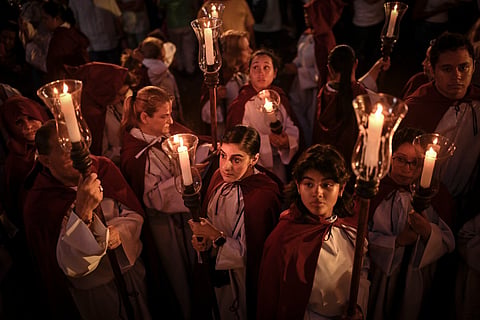 Catholic faithful take part in a procession of the Holy Supper at the Old Town during Holy Week in Panama City on April 2, 2026.