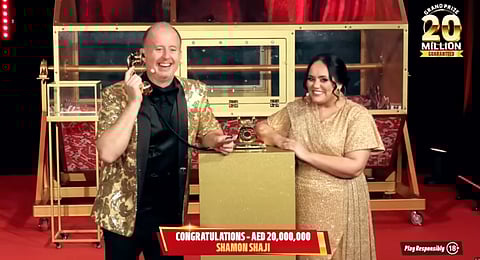 Show hosts Richard and Bouchra on the phone with Shaji during the live draw