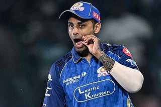 Mumbai Indians' captain Indian cricket player Suryakumar Yadav gestures at the end of the 2026 Indian Premier League (IPL) T20 match between Delhi Capitals and Mumbai Indians at the Arun Jaitley Stadium in New Delhi on April 4, 2026.