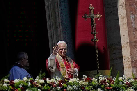 Pope Leo XIV addresses the faithful after delivering the Urbi et Orbi blessing - Latin for "to the city of Rome and to the world" - from the central loggia of St. Peter's Basilica at the end of Easter Mass he presided over in St. Peter's Square at the Vatican, Sunday, April 5, 2026. (AP Photo/Alessandra Tarantino)