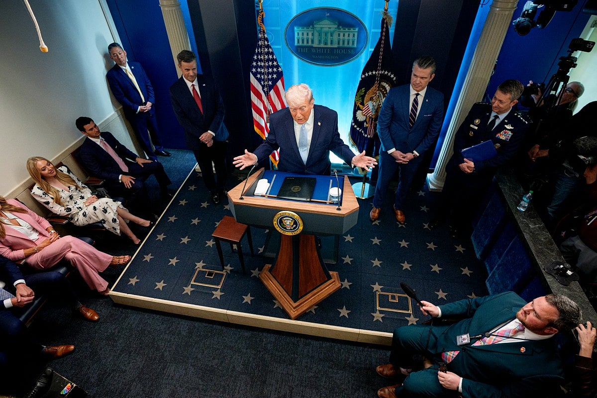 President Donald Trump, accompanied by CIA Director John Ratcliffe (C-L), Secretary of War Pete Hegseth (2nd-R) and Chairman of the Joint Chiefs of Staff General Dan Caine (R), speaks during a news conference in James S. Brady Press Briefing Room of the White House on April 06, 2026 in Washington, DC.