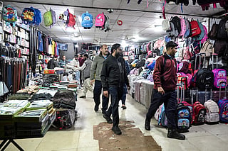 Police officers patrol a market in Islamabad on April 7, 2026. Authorities in Islamabad have ordered markets and shopping malls to close by 8pm.