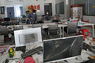 A work station at the scam compound in O'Smach, Cambodia, Tuesday, April 7, 2026, following a raid by authorities. US Treasury sanctioned Xinbi Guarantee, a Chinese-language financial platform that Washington says has become a major piece of the infrastructure supporting cyber scams, money laundering and other criminal activity. 