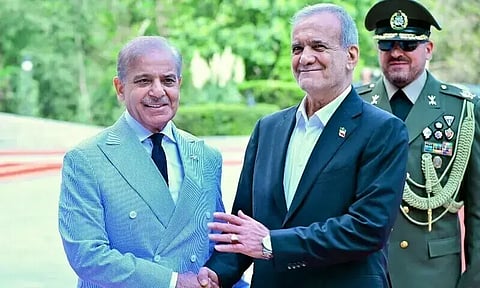 Pakistan Prime Minister Shehbaz Sharif and Iranian President Masoud Pezeshkian. File photo