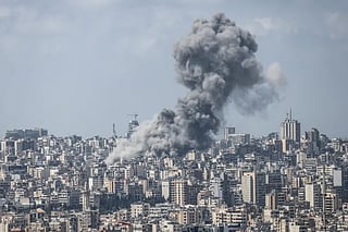 Smoke rises from the sites of Israeli air strikes on Beirut and its southern suburbs.