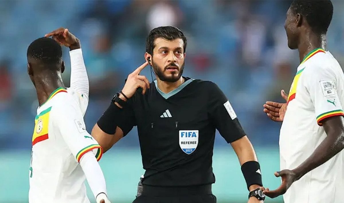 Referee Omar Mohamed Al Ali suspends the match due to thunderstorm warnings during the FIFA U-17 World Cup Group D match between Senegal and Poland at Si Jalak Harupat Stadium on November 14, 2023 in Bandung, Java, Indonesia. (Photo by Pakawich Damrongkiattisak - FIFA/FIFA via Getty Images)