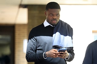 Former Arsenal midfielder Thomas Partey departs following his hearing at the Southwark Crown Court in London on April 13, 2026.