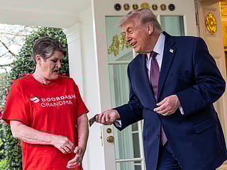 Sharon Simmons with DoorDash, gets a $100 tip after delivering McDonald's to President Donald Trump in the Oval Office of the White House.