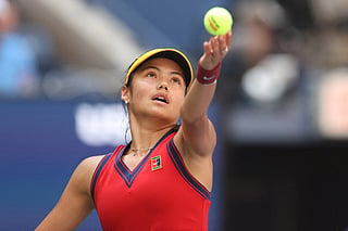 Emma Raducanu of the United Kingdom serves against Belinda Bencic of Switzerland during her Women’s Singles quarterfinals match on Day Ten of the 2021 US Open at the USTA Billie Jean King National Tennis Center on September 08, 2021 in the Flushing neighborhood of the Queens borough of New York City.
